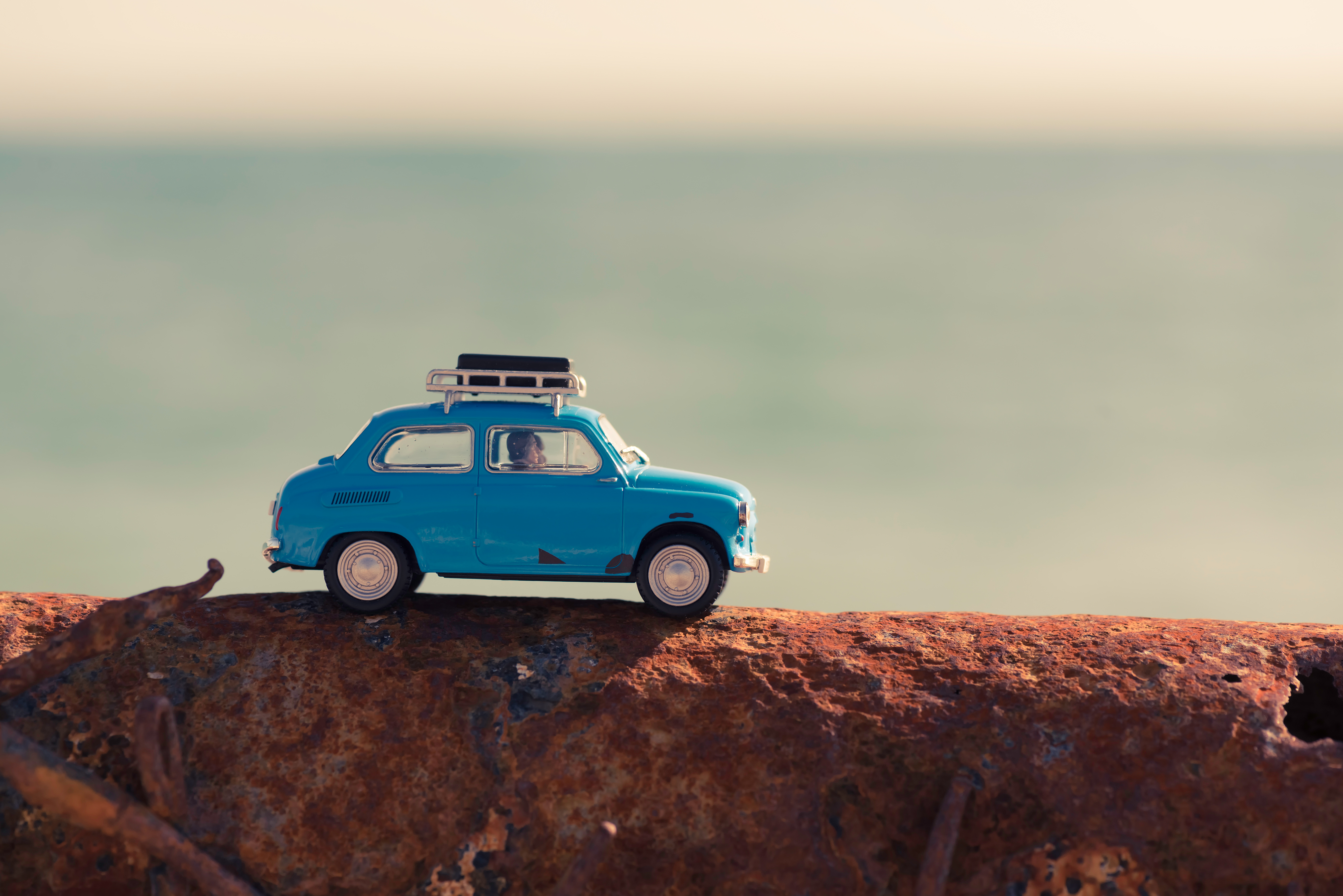 Vintage car parked near the sea. Travel and adventure concept